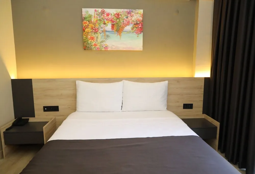 Deluxe Tek Büyük veya İki Ayrı Yataklı Oda