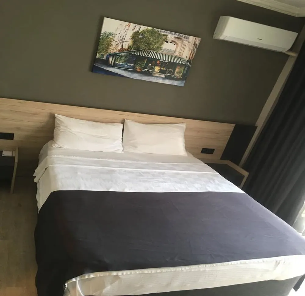 Deluxe Tek Büyük veya İki Ayrı Yataklı Oda