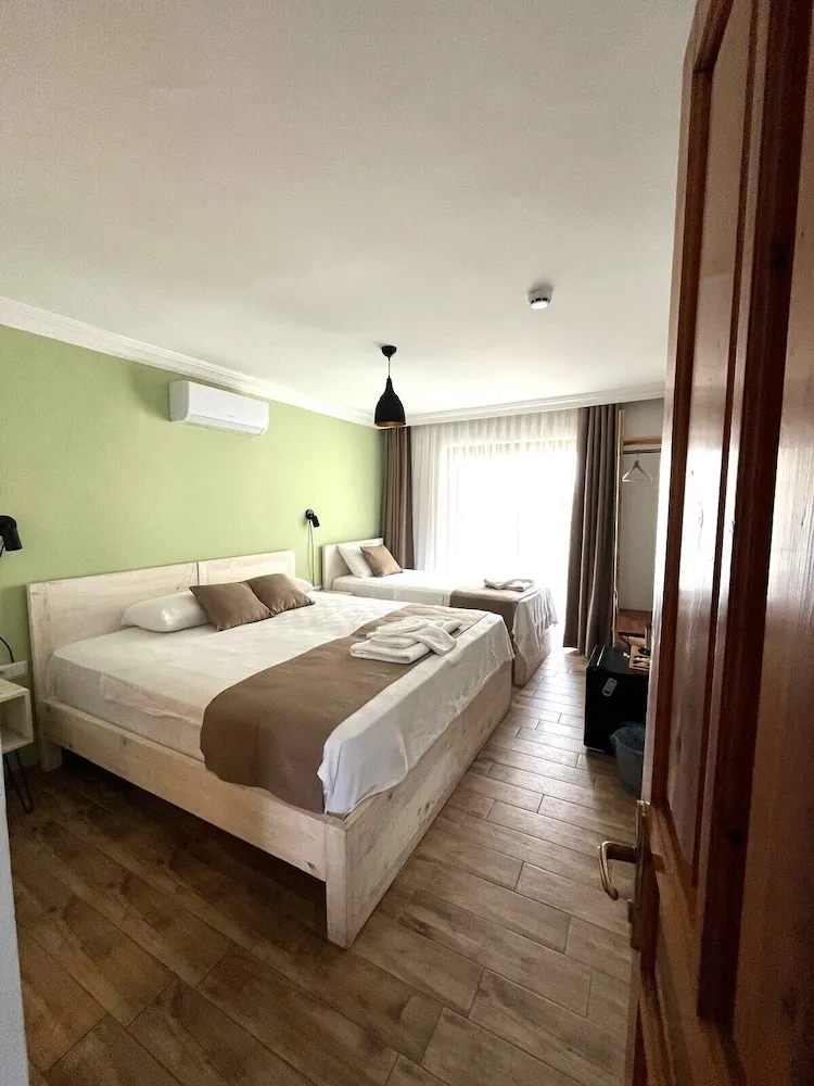 Deluxe Üç Kişilik Oda