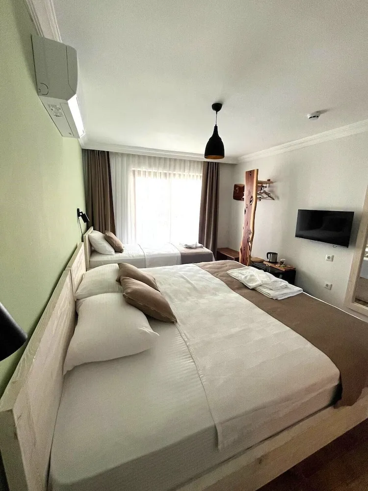 Deluxe Üç Kişilik Oda