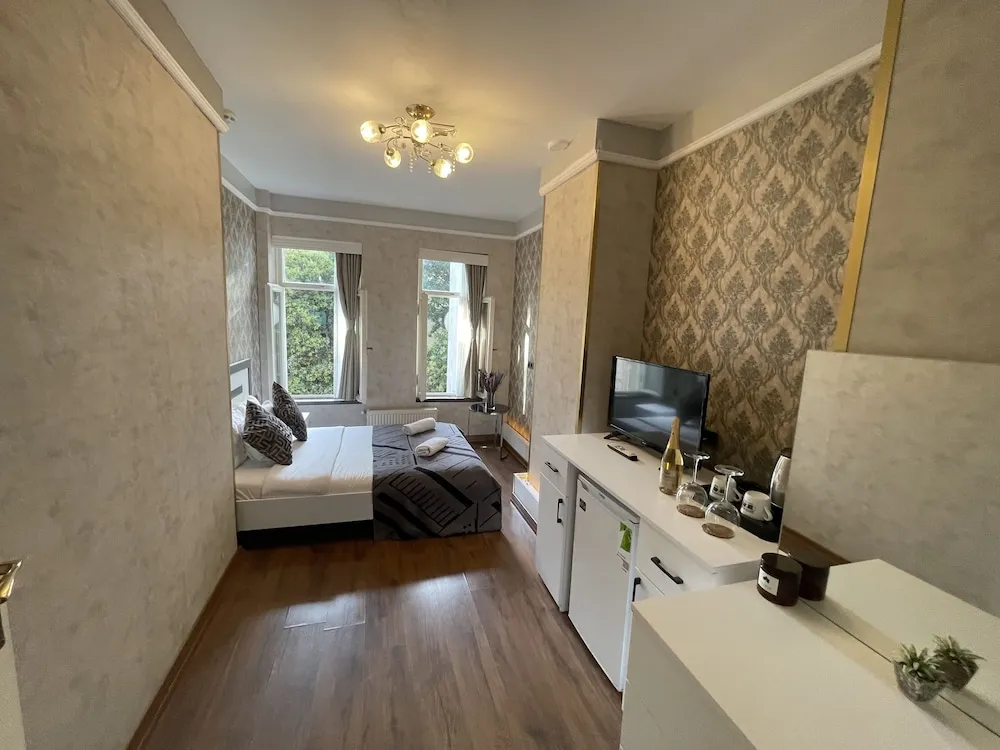 Design Üç Kişilik Oda, Bahçe Manzaralı