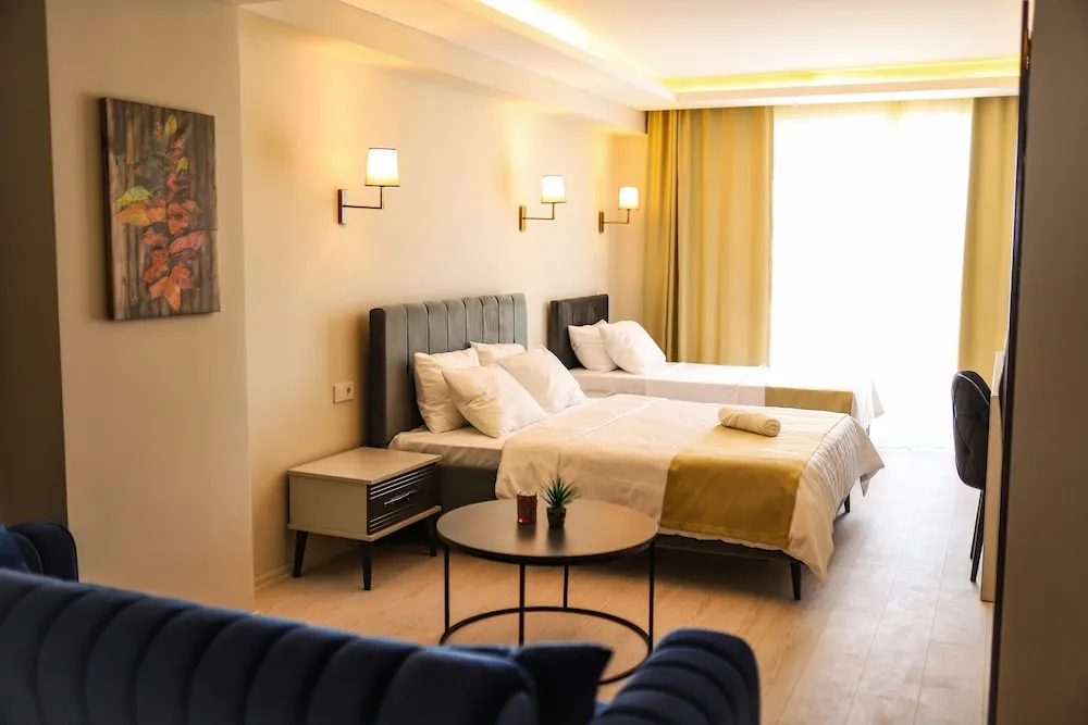 Deluxe Üç Kişilik Oda