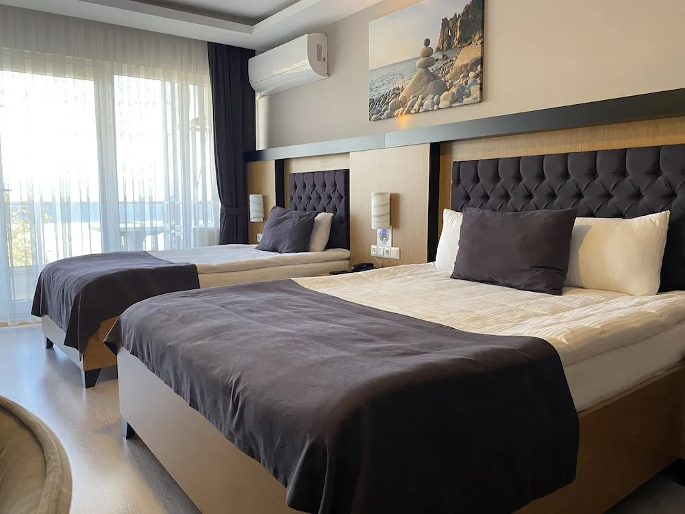 Deluxe Üç Kişilik Oda, Balkon, Deniz Manzaralı