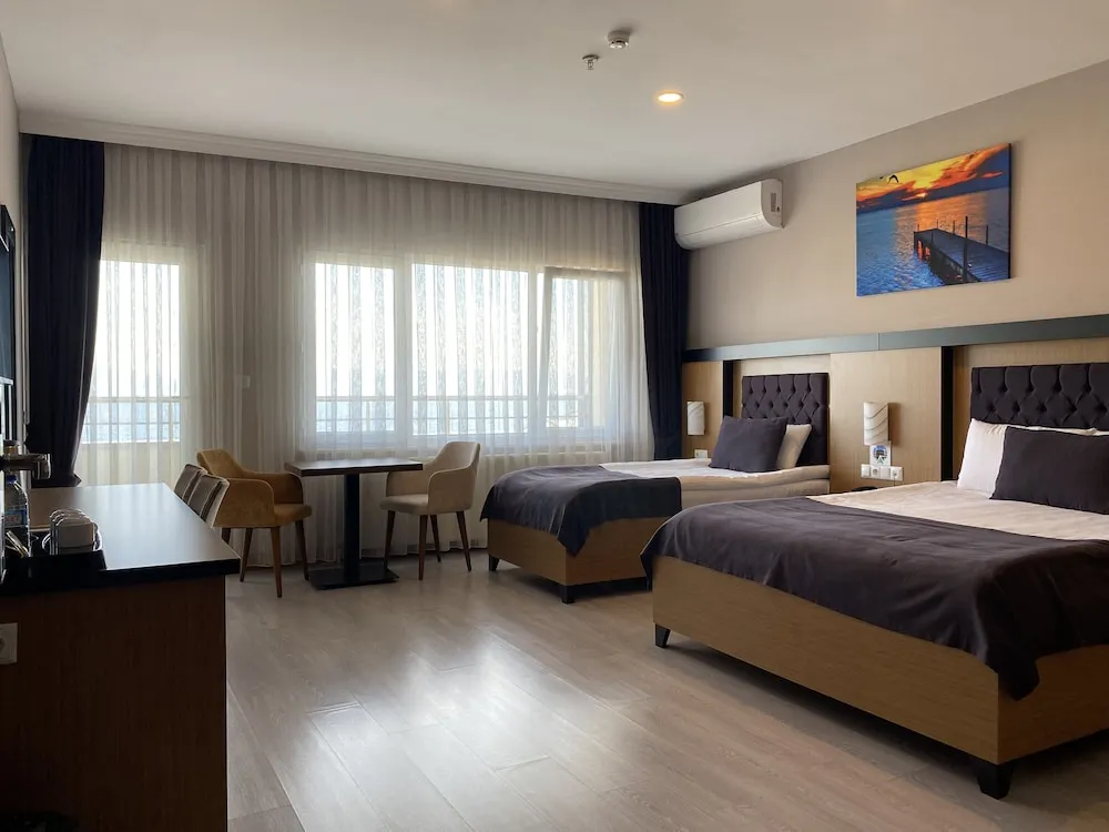 Deluxe Üç Kişilik Oda, Balkon, Deniz Manzaralı