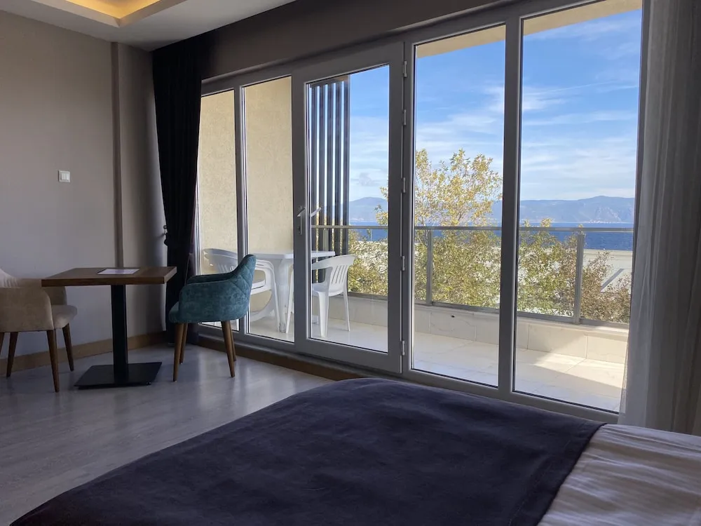 Deluxe Üç Kişilik Oda, Balkon, Deniz Manzaralı