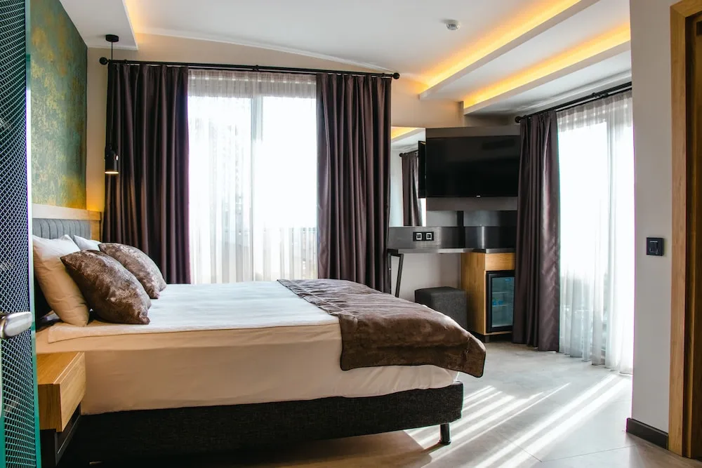 Deluxe Tek Büyük veya İki Ayrı Yataklı Oda