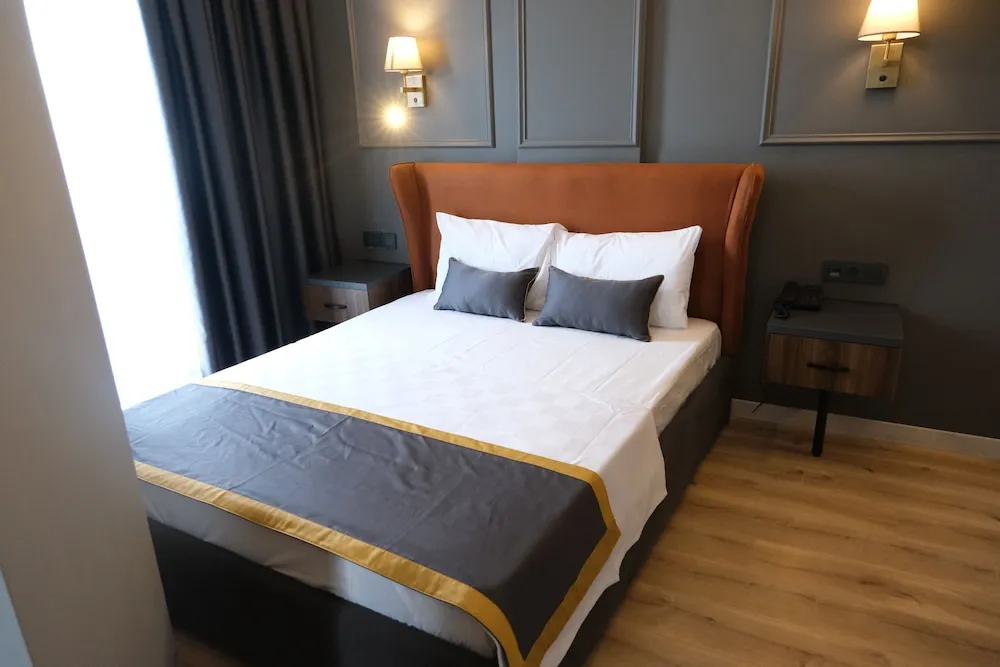 Deluxe Tek Büyük veya İki Ayrı Yataklı Oda