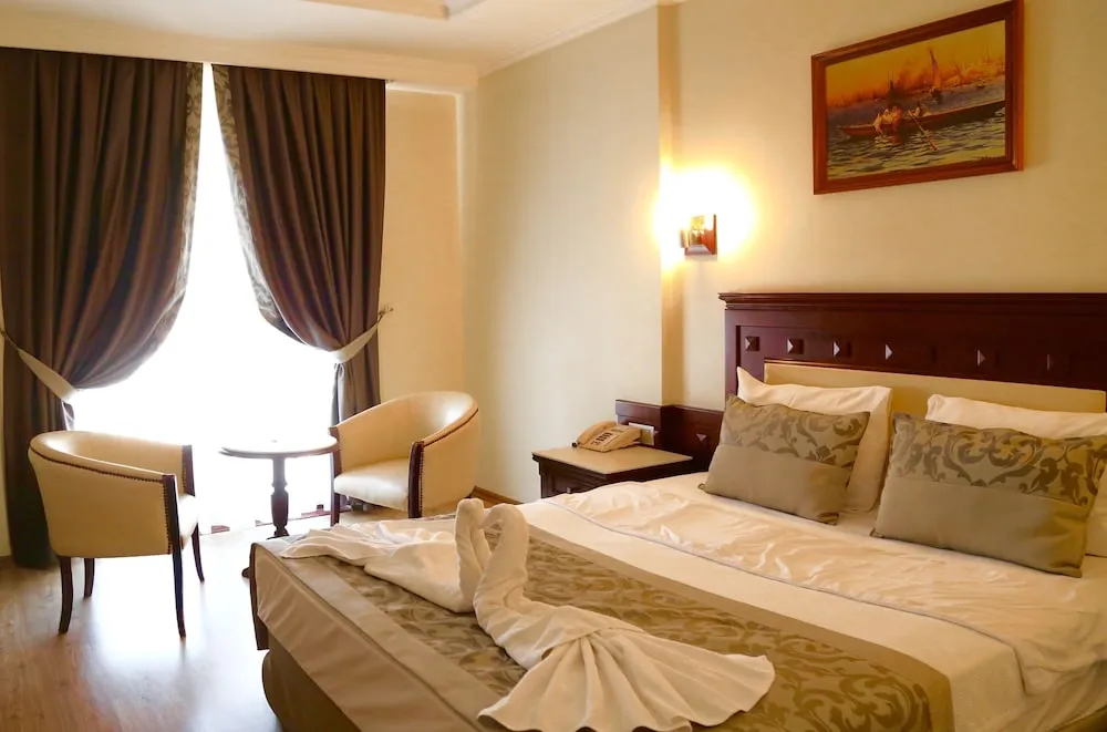 Deluxe Tek Büyük Yataklı Oda, 1 Çift Kişilik Yatak, Deniz Manzaralı, Denize Bakan