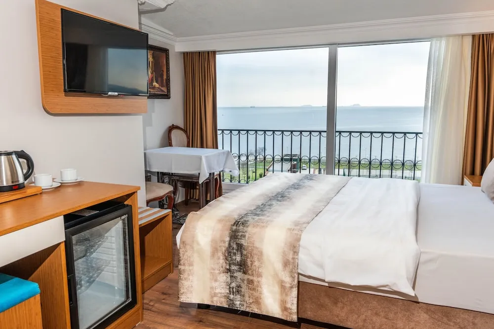 Deluxe Tek Büyük Yataklı Oda, Balkon, Deniz Manzaralı