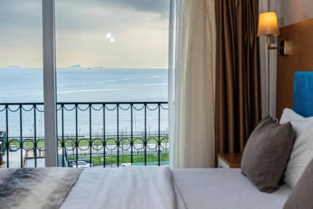 Deluxe Tek Büyük Yataklı Oda, Balkon, Deniz Manzaralı