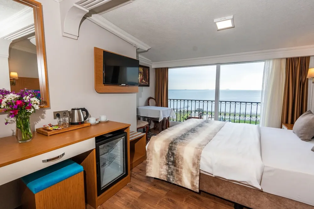 Deluxe Tek Büyük Yataklı Oda, Balkon, Deniz Manzaralı