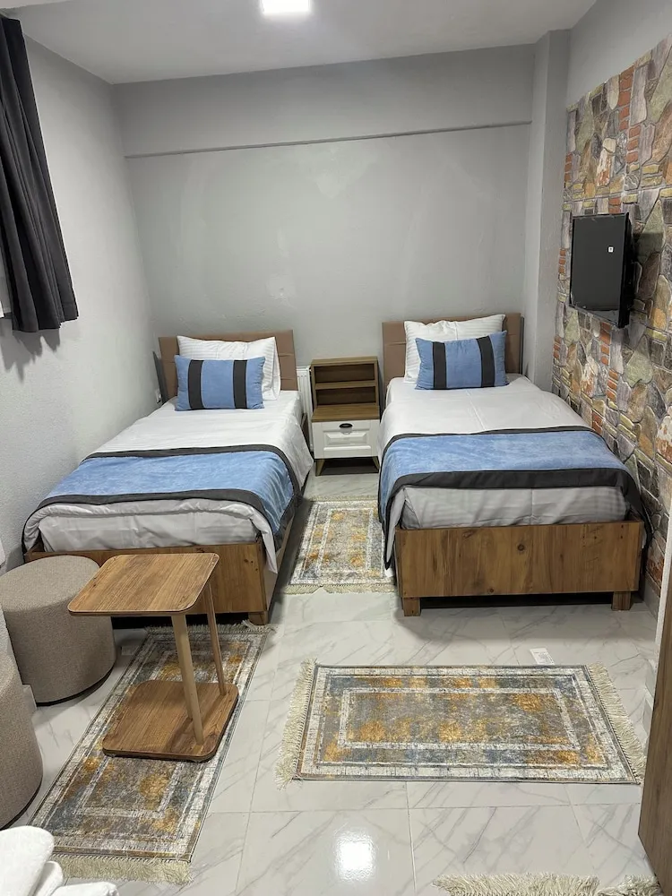 Economy Tek Büyük veya İki Ayrı Yataklı Oda