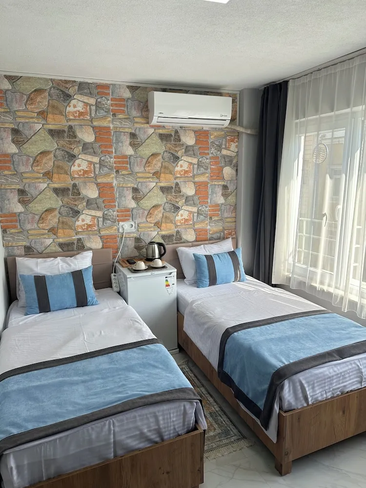 Deluxe Tek Büyük veya İki Ayrı Yataklı Oda