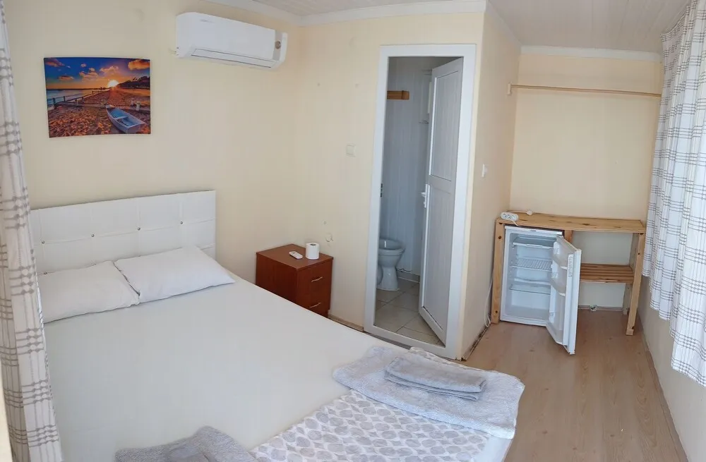 Exclusive Tek Büyük Yataklı Oda