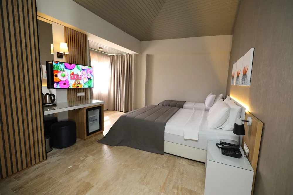 Deluxe Üç Kişilik Oda