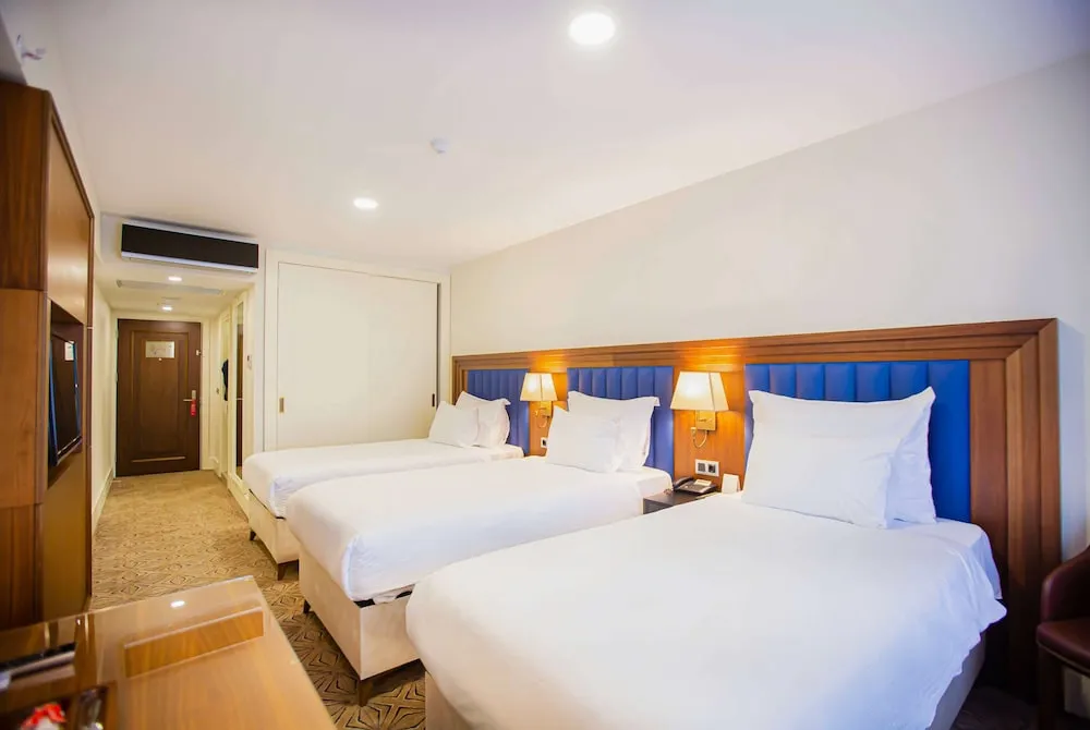 Deluxe Oda, 3 Tek Kişilik Yatak