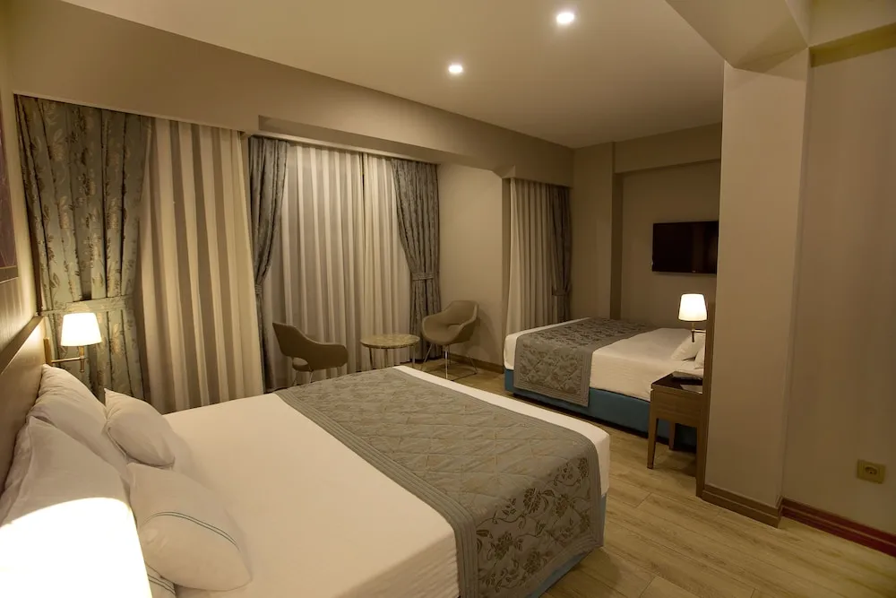 Family Üç Kişilik Oda