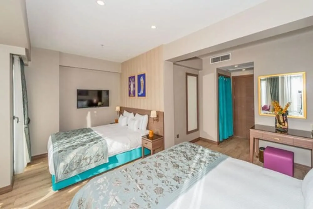 Family Üç Kişilik Oda