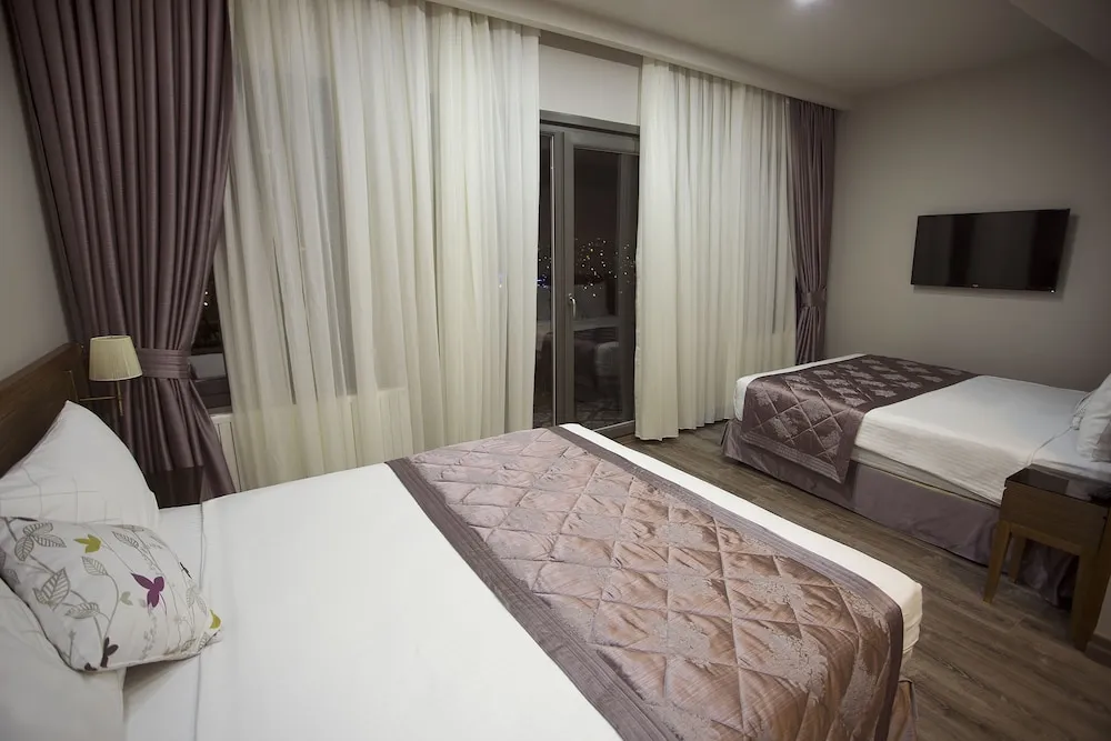 Family Üç Kişilik Oda