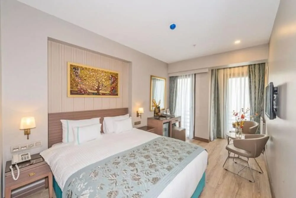 Deluxe Tek Büyük Yataklı Oda