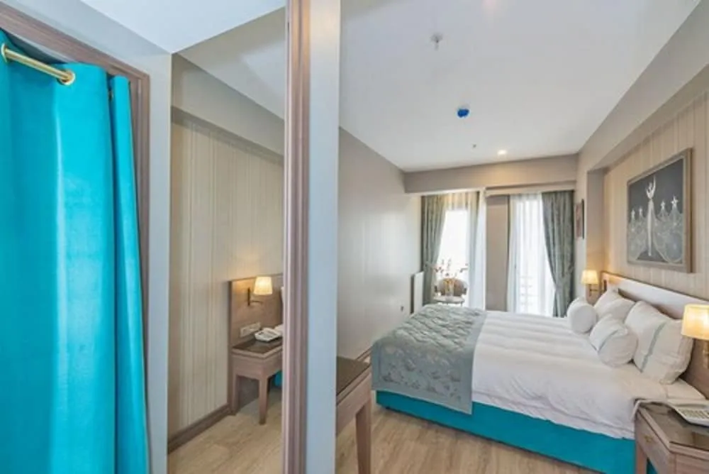 Deluxe Tek Büyük Yataklı Oda