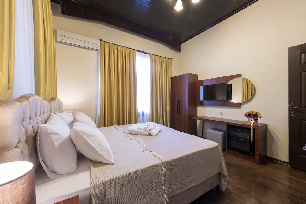 Grand Üç Kişilik Oda