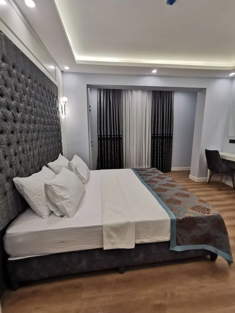 Deluxe Tek Büyük veya İki Ayrı Yataklı Oda