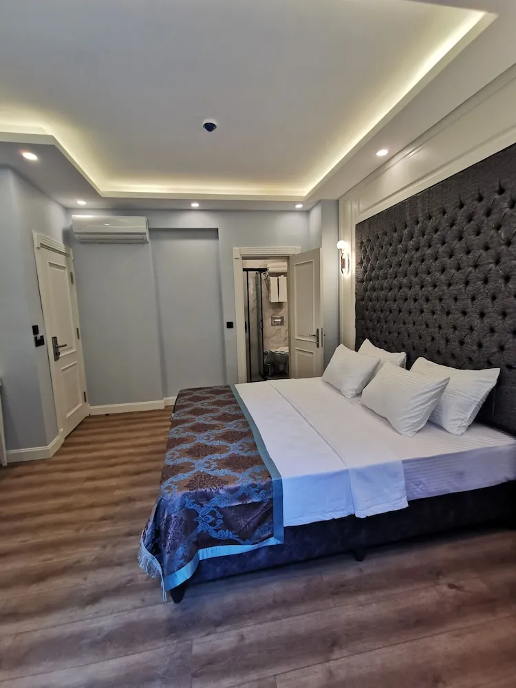 Deluxe Tek Büyük veya İki Ayrı Yataklı Oda