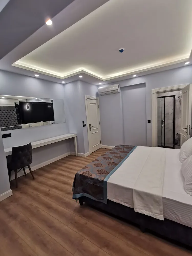 Deluxe Tek Büyük veya İki Ayrı Yataklı Oda