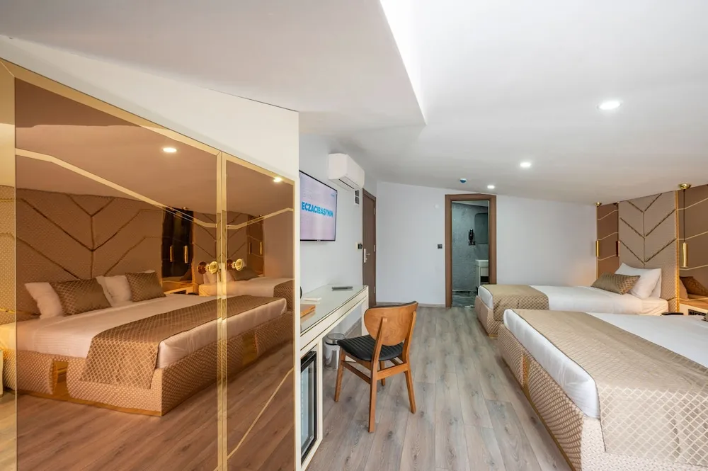 Deluxe Üç Kişilik Oda