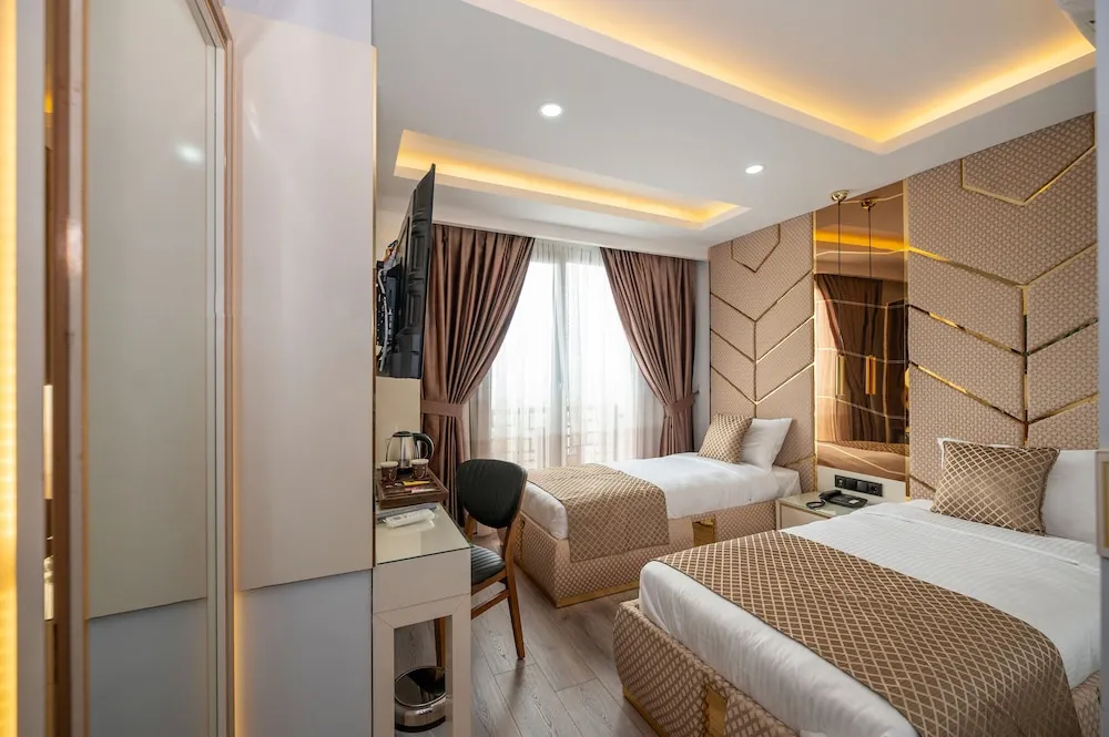 Deluxe Üç Kişilik Oda