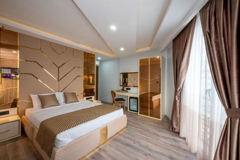 Deluxe Tek Büyük veya İki Ayrı Yataklı Oda