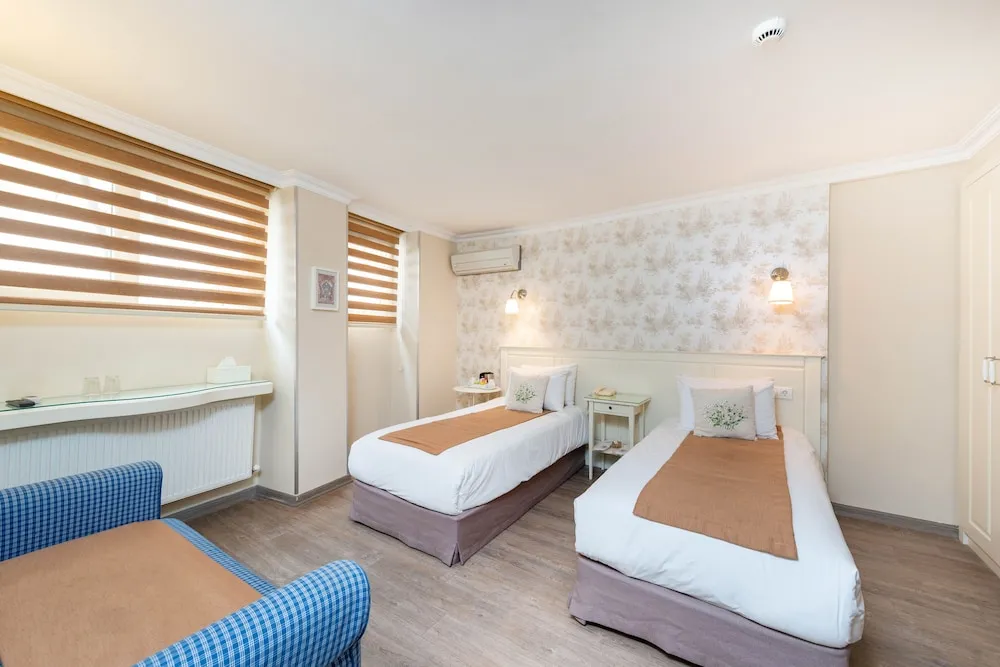 Economy Tek Büyük veya İki Ayrı Yataklı Oda