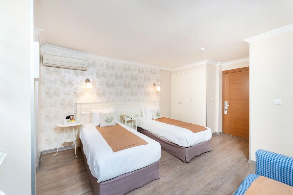 Economy Tek Büyük veya İki Ayrı Yataklı Oda