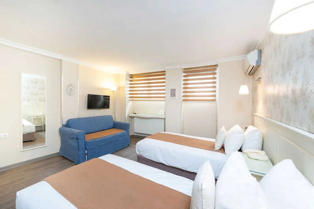 Economy Tek Büyük veya İki Ayrı Yataklı Oda