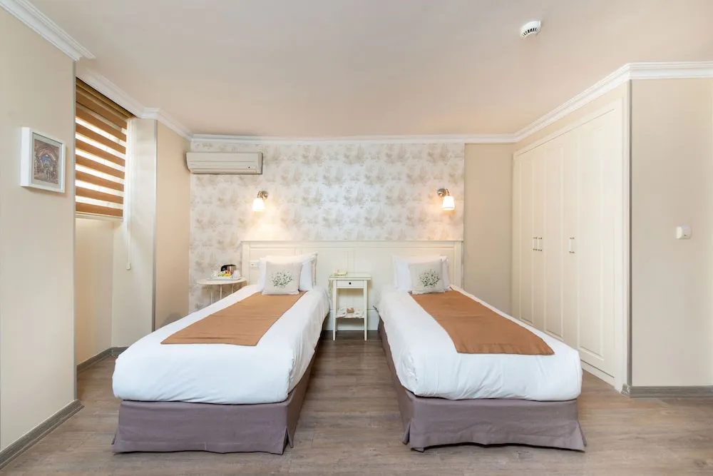 Economy Tek Büyük veya İki Ayrı Yataklı Oda