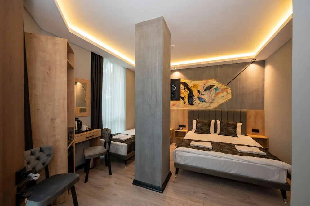 Deluxe Üç Kişilik Oda