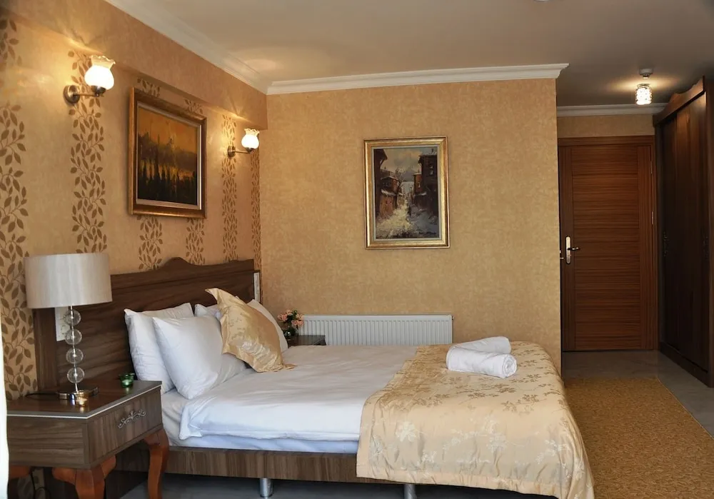 Economy Tek Büyük veya İki Ayrı Yataklı Oda