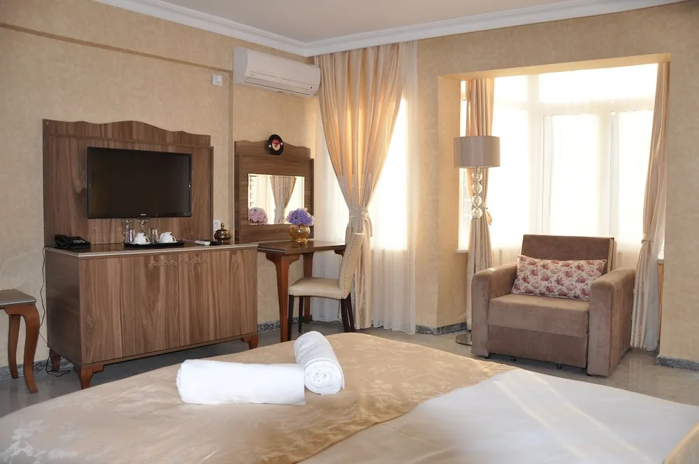 Economy Tek Büyük veya İki Ayrı Yataklı Oda