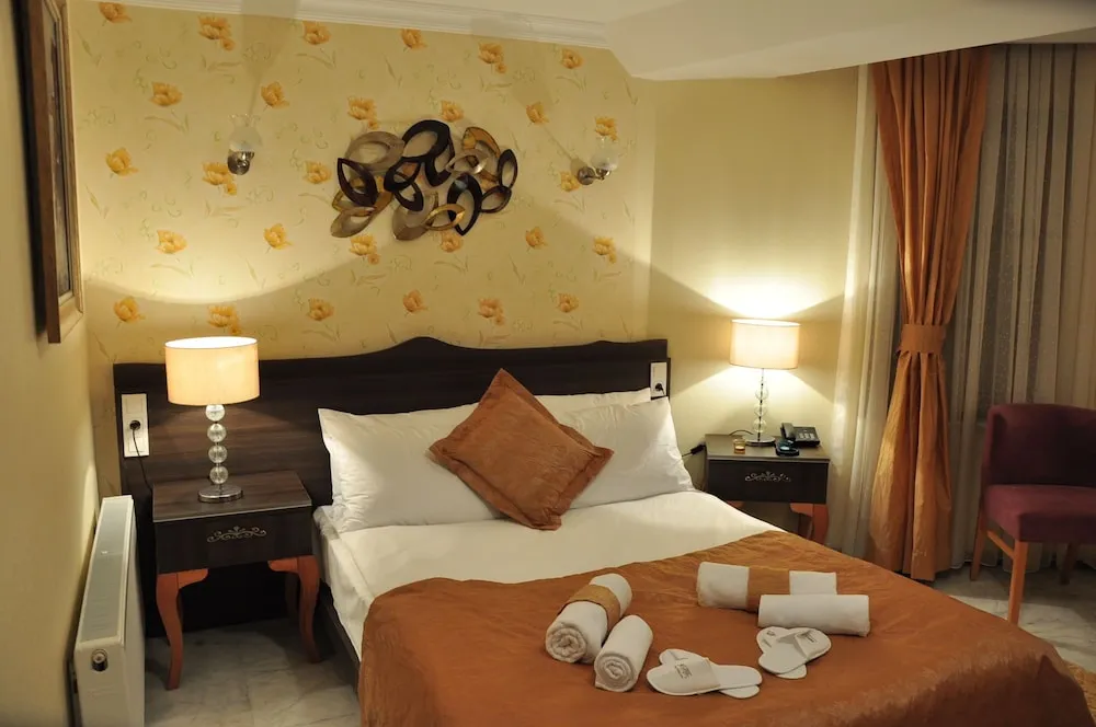 Economy Tek Büyük veya İki Ayrı Yataklı Oda