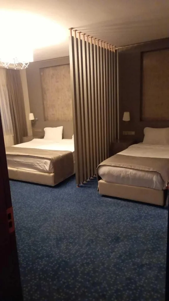 Deluxe Üç Kişilik Oda