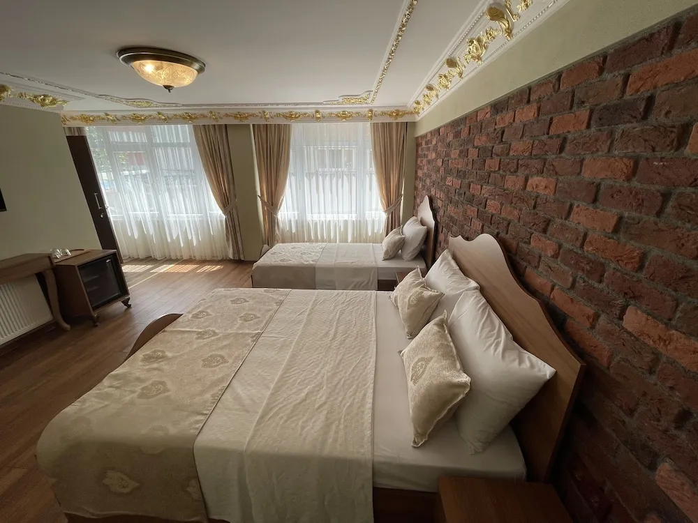 Deluxe Üç Kişilik Oda