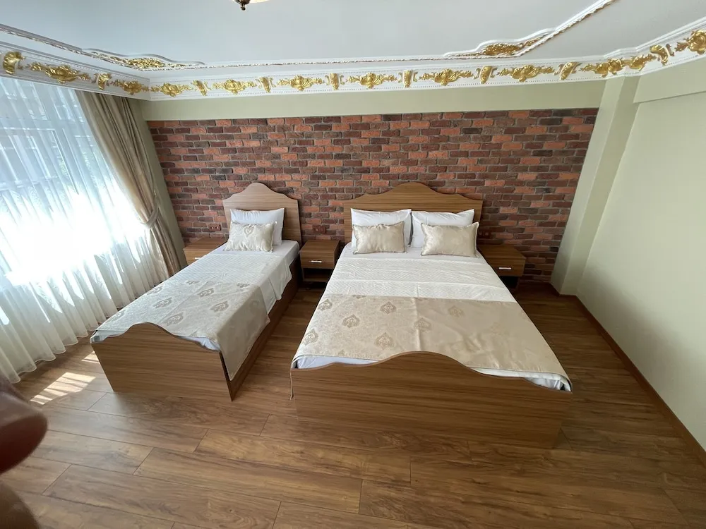 Deluxe Üç Kişilik Oda