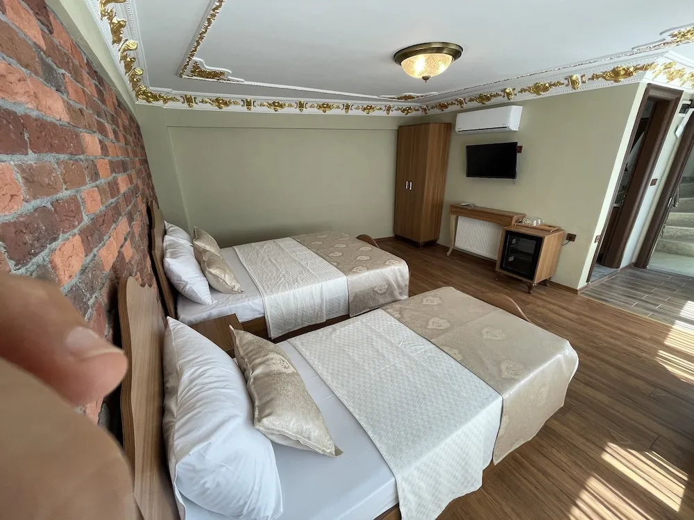 Deluxe Üç Kişilik Oda