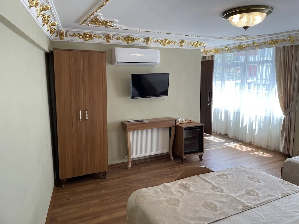 Deluxe Üç Kişilik Oda