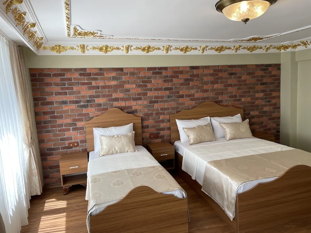 Deluxe Üç Kişilik Oda