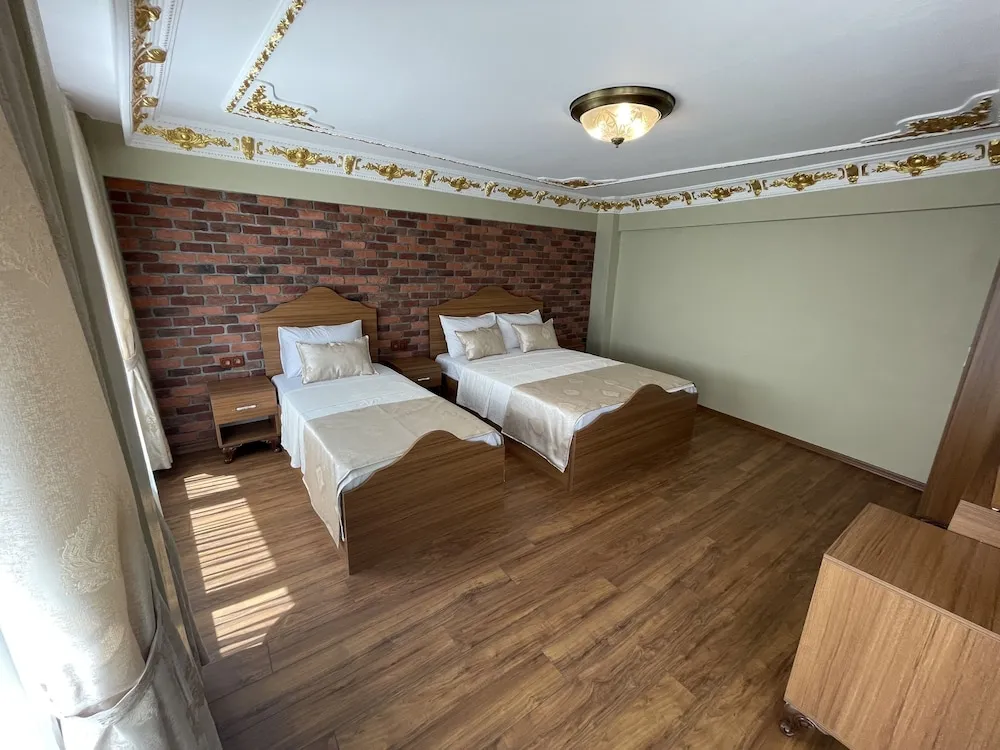 Deluxe Üç Kişilik Oda