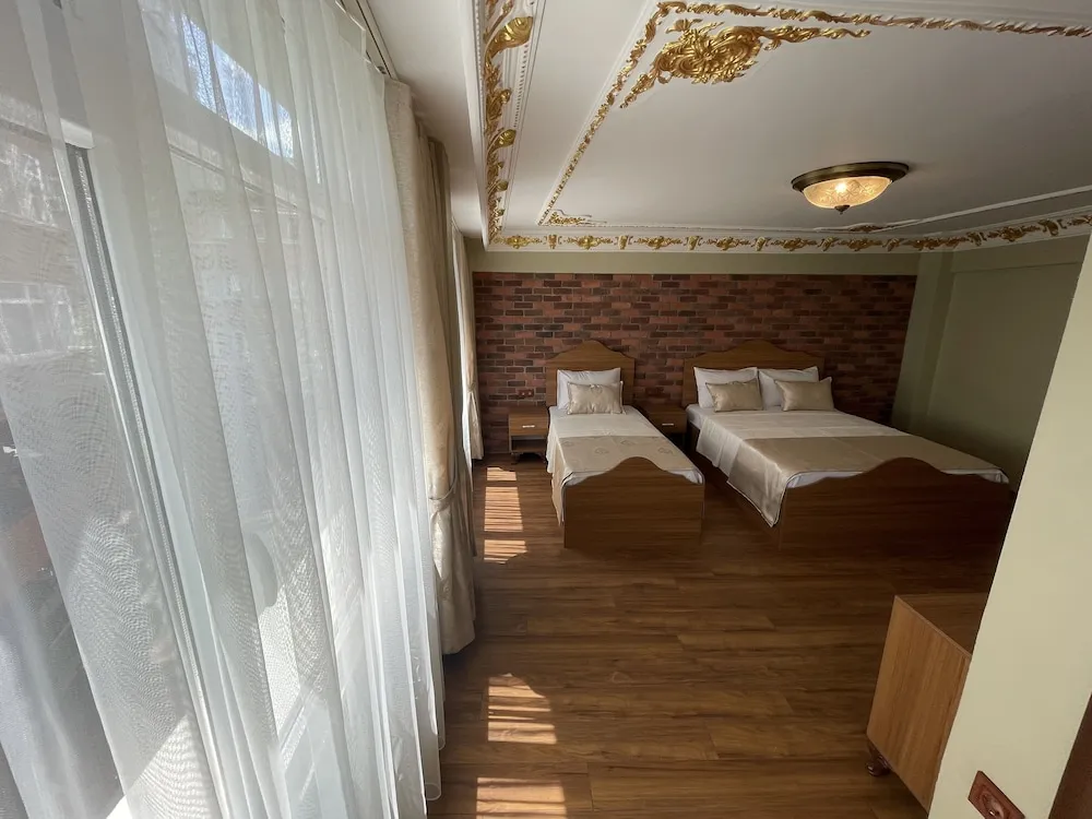 Deluxe Üç Kişilik Oda