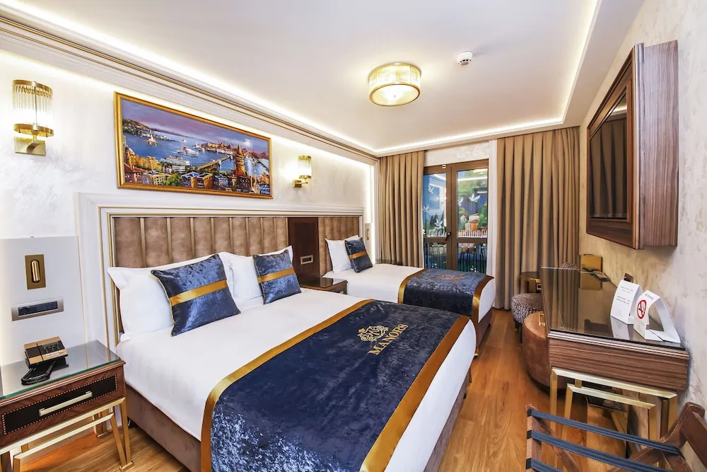 Deluxe Üç Kişilik Oda