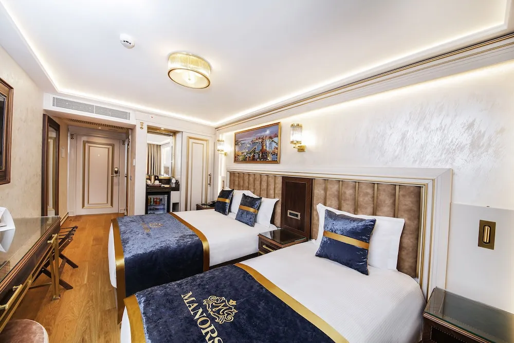 Deluxe Üç Kişilik Oda